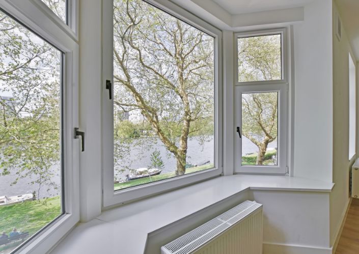 bay window looking out with view of trees